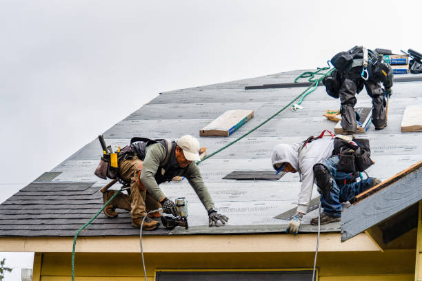 Professional Gutter Installation technician working in State Center, IA